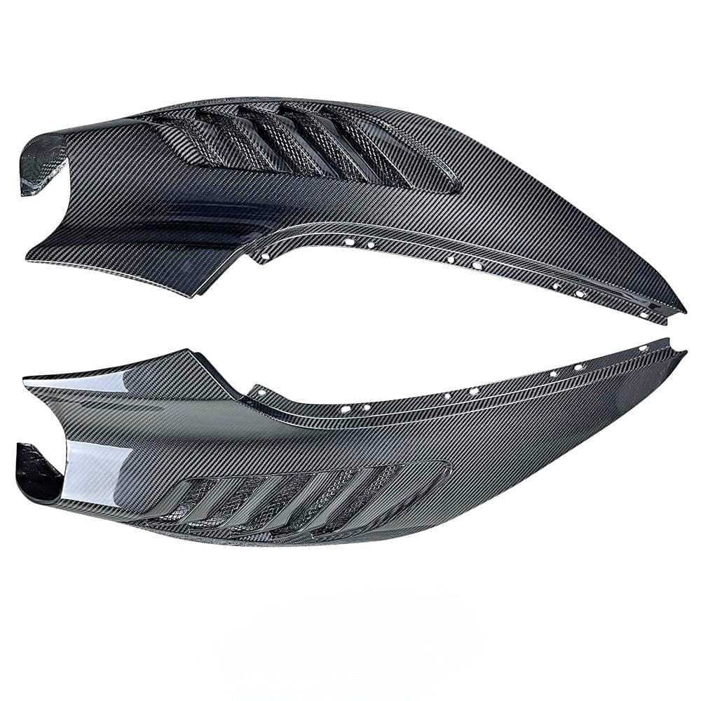 V-Style dry carbon fiber fenders for McLaren 720S featuring integrated aerodynamic vent design, full exposed carbon fiber construction, and aggressive supercar styling.