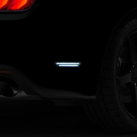 Car taillight and brake light on a dark background