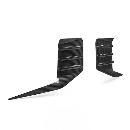 MP Style dry carbon fiber rear bumper canards for BMW G87 M2 featuring aerodynamic fin design, lightweight construction, and OEM-inspired performance styling.
