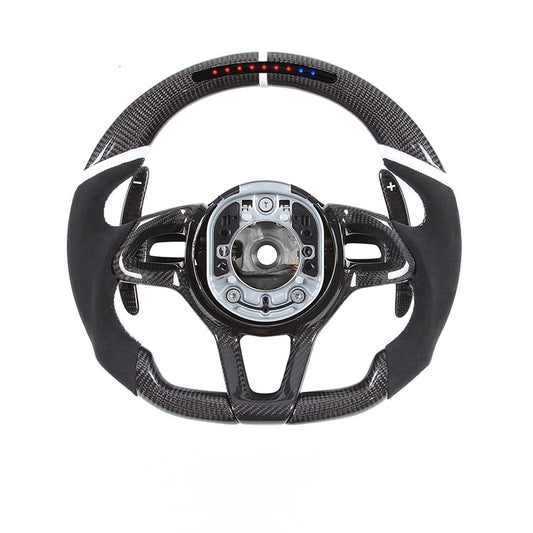 Custom carbon fiber steering wheel for McLaren 570S featuring integrated LED shift lights, ergonomic performance grips, and premium carbon fiber construction.